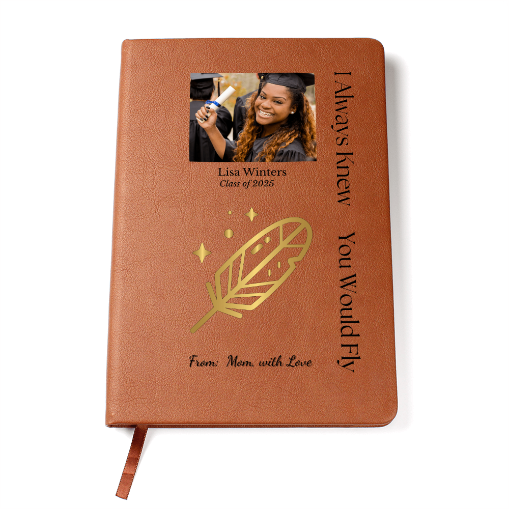 Graduation journal with brown vegan leather cover, gold feather design, personalized photo, and quote: "I Always Knew You Would Fly" – gift from Mom.

